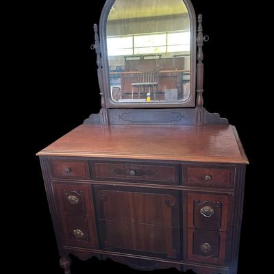 Sale Photo Thumbnail #7: 2) 66 X 40 X 20 Arched tilt mirror  5-drawer configuration with drop-pull hardware  two-tone wood inlay accents  carved scrollwork  and turned legs. 66 X 40 X 20    