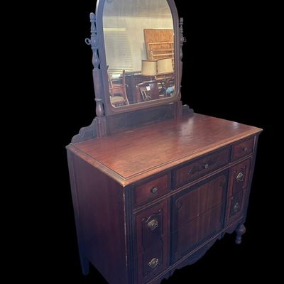 Sale Photo Thumbnail #9: 2) 66 X 40 X 20 Arched tilt mirror  5-drawer configuration with drop-pull hardware  two-tone wood inlay accents  carved scrollwork  and turned legs. 66 X 40 X 20    