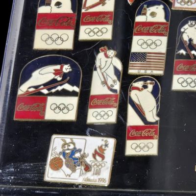 Sale Photo Thumbnail #64:  Coca-Cola Olympic Pin Set  Two 8 oz Bottles  and 1993 Final Four Tube.                           