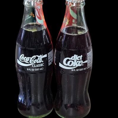 Sale Photo Thumbnail #67:  Coca-Cola Olympic Pin Set  Two 8 oz Bottles  and 1993 Final Four Tube.                           