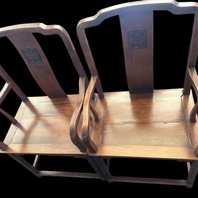 Sale Photo Thumbnail #79: 42.75"T  29" arm ht  20.5" seat ht  23" seat width Solid hardwood construction featuring curved yoke top crests  back splats carved with character medallion longevity symbols  slatted armrests  box stretcher bases  and removable striped seat cushions Chin