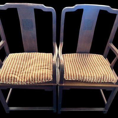 Sale Photo Thumbnail #80: 42.75"T  29" arm ht  20.5" seat ht  23" seat width Solid hardwood construction featuring curved yoke top crests  back splats carved with character medallion longevity symbols  slatted armrests  box stretcher bases  and removable striped seat cushions Chin