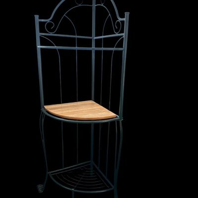 Sale Photo Thumbnail #150: 65"T × 25"W × 18"D Dark green metal scrollwork corner plant stand/shelf featuring arched crest wirework  top and bottom metal grid shelves  a center solid wood shelf insert  and scroll feet. Dimensions: 64" Tall x 25" Wide x 18" Deep.  