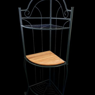 Sale Photo Thumbnail #149: 65"T × 25"W × 18"D Dark green metal scrollwork corner plant stand/shelf featuring arched crest wirework  top and bottom metal grid shelves  a center solid wood shelf insert  and scroll feet. Dimensions: 64" Tall x 25" Wide x 18" Deep.  