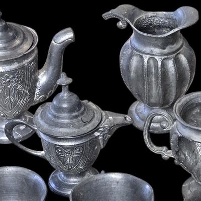 Sale Photo Thumbnail #180:  Pewter Miniature Tea Set  About 29 Pieces.                           