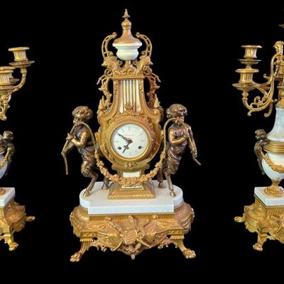 Sale Photo Thumbnail #244:  Antique Gilded Clock and Candelabra Set with Cherub Motif.                           