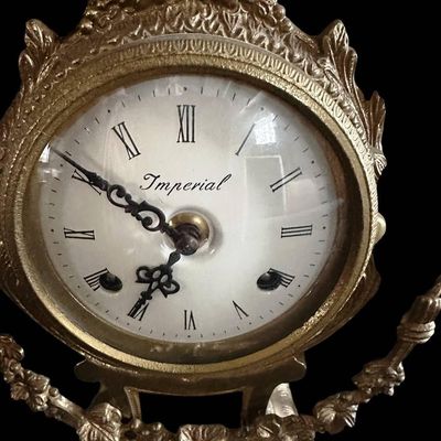 Sale Photo Thumbnail #242:  Antique Gilded Clock and Candelabra Set with Cherub Motif.                           