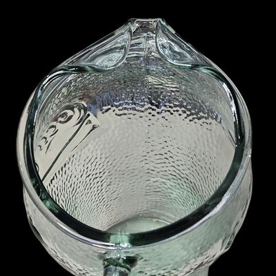 Sale Photo Thumbnail #408:  Coca-Cola Hammered Glass Pitcher.                           