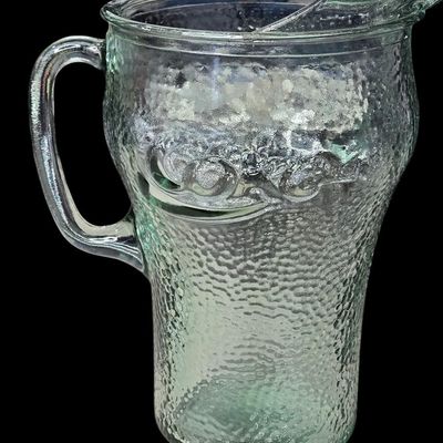 Sale Photo Thumbnail #406:  Coca-Cola Hammered Glass Pitcher.                           
