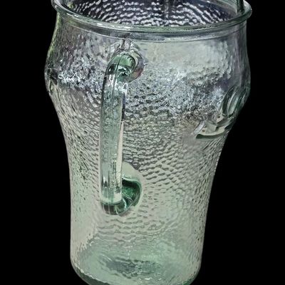 Sale Photo Thumbnail #407:  Coca-Cola Hammered Glass Pitcher.                           