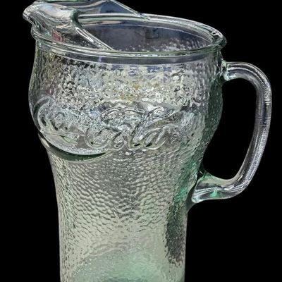 Sale Photo Thumbnail #404:  Coca-Cola Hammered Glass Pitcher.                           