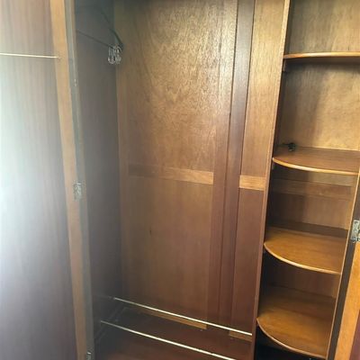 Sale Photo Thumbnail #468: Substantial antique solid wood armoire featuring double doors and spacious interior storage.75" X 49" X 22"  