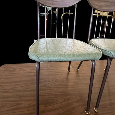 Sale Photo Thumbnail #589: 29.50 Tall 70.50 Long (w/leaves) 46.00 (w/o leaves) 35.50 Wide 11.50 (each leaf) MCM dining set featuring walnut-tone laminate rectangular table with extension leaf and tapered black metal legs with brass ferrule feet  paired with 6 matching chairs featur