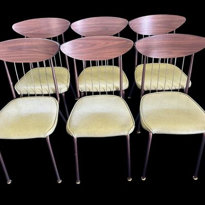 Sale Photo Thumbnail #591: 29.50 Tall 70.50 Long (w/leaves) 46.00 (w/o leaves) 35.50 Wide 11.50 (each leaf) MCM dining set featuring walnut-tone laminate rectangular table with extension leaf and tapered black metal legs with brass ferrule feet  paired with 6 matching chairs featur