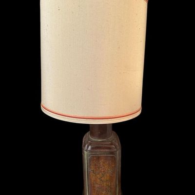 Sale Photo Thumbnail #616: Chinoiserie Ceramic Tea Caddy Table Lamp  vintage Asian accent table lamp  featuring painted floral panels with brass trim and original cylindrical fabric drum shade with pink accent piping.