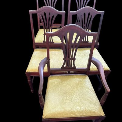 Sale Photo Thumbnail #660: Set of 5 rich mahogany dining chairs (1 armchair  4 side chairs) featuring pierced fan/splat backrests  serpentine top crests  turned front legs  and damask floral brocade fabric seat cushions.  