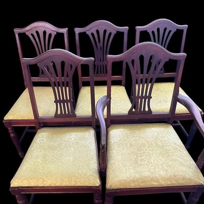 Sale Photo Thumbnail #657: Set of 5 rich mahogany dining chairs (1 armchair  4 side chairs) featuring pierced fan/splat backrests  serpentine top crests  turned front legs  and damask floral brocade fabric seat cushions.  