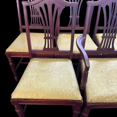 Sale Photo Thumbnail #659: Set of 5 rich mahogany dining chairs (1 armchair  4 side chairs) featuring pierced fan/splat backrests  serpentine top crests  turned front legs  and damask floral brocade fabric seat cushions.  