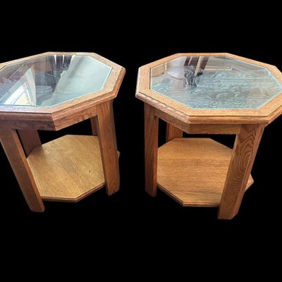 Sale Photo Thumbnail #667: 20 x 22 each Pair of 8-sided solid oak octagonal accent end tables featuring inset etched glass tops—one featuring a flying bald eagle scene and the other featuring a grizzly bear in wilderness—over lower open display shelves. 20 x 22 each.   