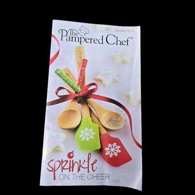 Sale Photo Thumbnail #702:  Pampered Chef 15-inch round baking stone with handles. NWT.                           