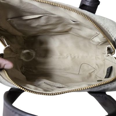 Sale Photo Thumbnail #710:  Fossil Gold and Brown Purse.                           