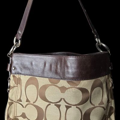 Sale Photo Thumbnail #750:  Coach signature jacquard hobo. Pre-owned.     $55                     