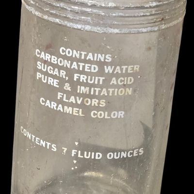 Sale Photo Thumbnail #806:  Dr. Nut 7 oz New Orleans regional soda bottle. Label damaged.                           