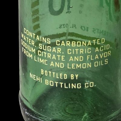 Sale Photo Thumbnail #821:  Upper 10 10 oz bottle.                           