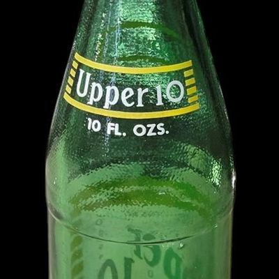 Sale Photo Thumbnail #820:  Upper 10 10 oz bottle.                           