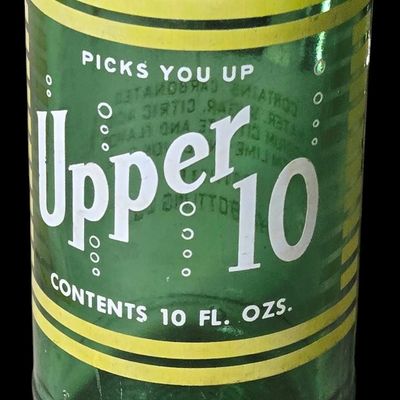 Sale Photo Thumbnail #819:  Upper 10 10 oz bottle.                           