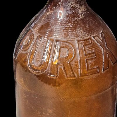 Sale Photo Thumbnail #827:  Purex amber bleach bottle. Owens-Illinois base 15 I 53 — 1953.                           