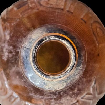 Sale Photo Thumbnail #828:  Purex amber bleach bottle. Owens-Illinois base 15 I 53 — 1953.                           