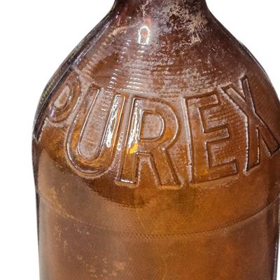 Sale Photo Thumbnail #831:  Purex amber bleach bottle. Owens-Illinois base 15 I 53 — 1953.                           