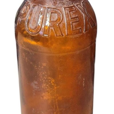 Sale Photo Thumbnail #830:  Purex amber bleach bottle. Owens-Illinois base 15 I 53 — 1953.                           