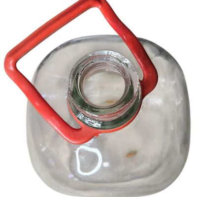Sale Photo Thumbnail #856:  Large clear utility jug with handle.                           