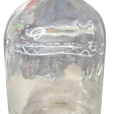 Sale Photo Thumbnail #855:  Large clear utility jug with handle.                           
