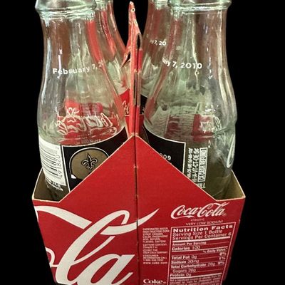 Sale Photo Thumbnail #869:  2009 New Orleans Saints World Champions Coca-Cola 6-pack carrier.