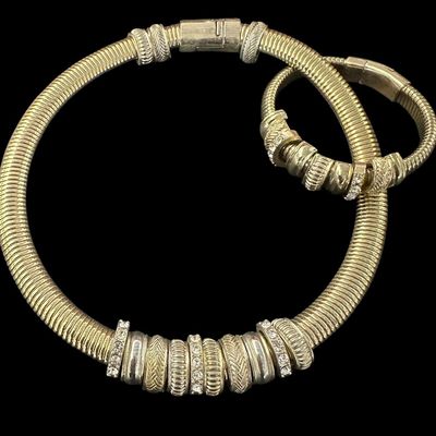 Sale Photo Thumbnail #883:  Gold-tone necklace / bracelet.                           