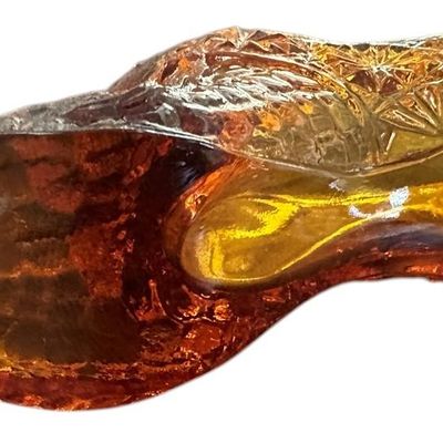 Sale Photo Thumbnail #903:  Amber pressed-glass slipper with cat on the heel. Fenton-style novelty. Check ear for chips.                           