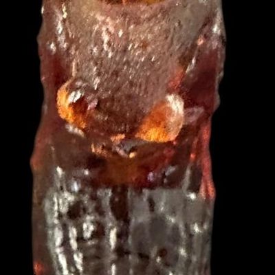 Sale Photo Thumbnail #895:  Amber pressed-glass slipper with cat on the heel. Fenton-style novelty. Check ear for chips.                           