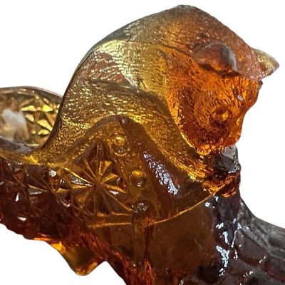 Sale Photo Thumbnail #899:  Amber pressed-glass slipper with cat on the heel. Fenton-style novelty. Check ear for chips.                           