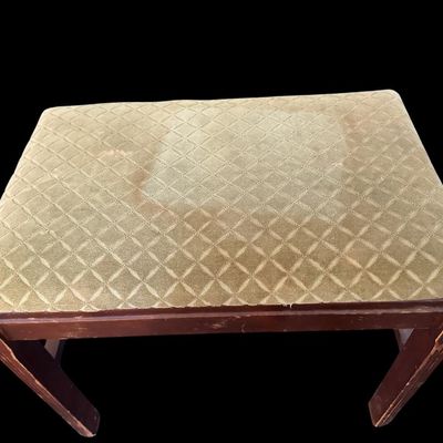 Sale Photo Thumbnail #952: 19.00 x 16.00 Rectangular wood footstool/vanity bench with fluted corner legs  lower cross stretchers  and padded sage green geometric diamond pattern upholstered seat cushion. 19.00 x 16.00  