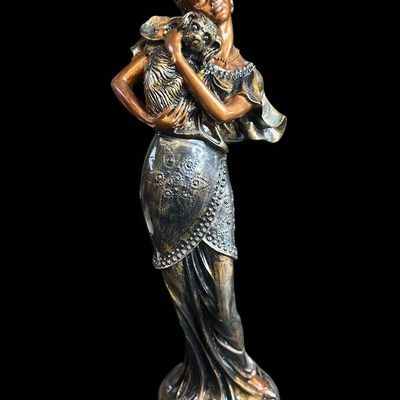 Sale Photo Thumbnail #972:  14.75-Inch Art Nouveau Woman Holding Dog Figurine.                           