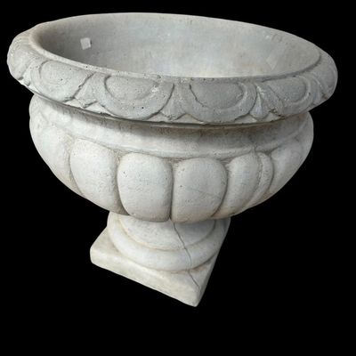 Sale Photo Thumbnail #986: Substantial round cast concrete garden planter featuring deeply relief-carved acanthus scroll motifs and smooth thick rim with naturally weathered finish.  