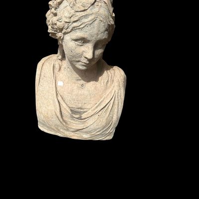 Sale Photo Thumbnail #987: Heavy cast concrete classical bust statue depicting a draped maiden with braided hair  suitable for garden or indoor pedestal display.  