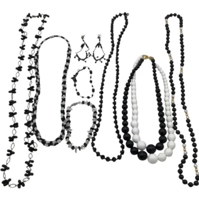 Sale Photo Thumbnail #277: 5 necklaces, one bracelet, one pair of earrings and one anklet
all in excellent condition.