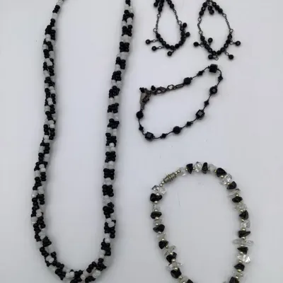 Sale Photo Thumbnail #280: 5 necklaces, one bracelet, one pair of earrings and one anklet
all in excellent condition.