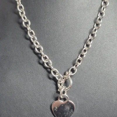 Sale Photo Thumbnail #287: Sterling Silver Hear fancy link Toggle Necklace
hand crafted with polished finish
elegant hear pendant with secure toggle clasp
925 construction marked on toggle round