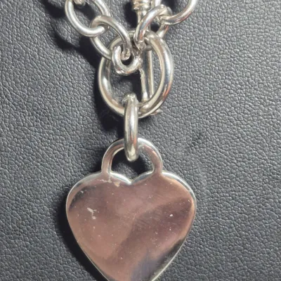 Sale Photo Thumbnail #289: Sterling Silver Hear fancy link Toggle Necklace
hand crafted with polished finish
elegant hear pendant with secure toggle clasp
925 construction marked on toggle round
