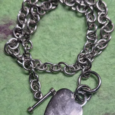 Sale Photo Thumbnail #285: Sterling Silver Hear fancy link Toggle Necklace
hand crafted with polished finish
elegant hear pendant with secure toggle clasp
925 construction marked on toggle round